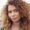 young pretty woman with long and thick brown wavy 2025 03 08 16 31 06 utc